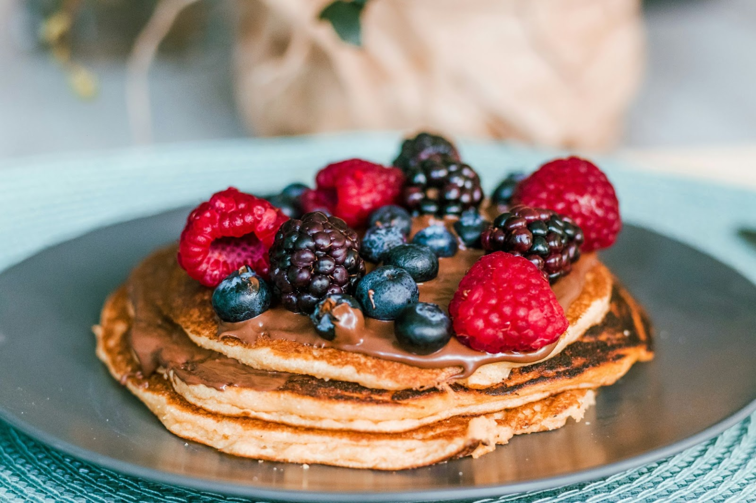 Experts reveal the trending pancake toppings for 2025 and where to travel to enjoy them authentically