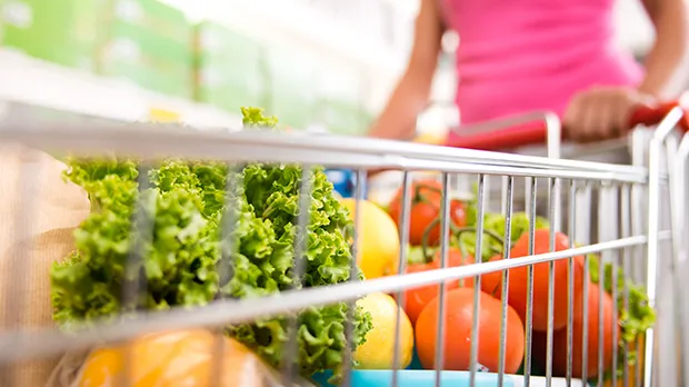 Ultimate Guide to UK Supermarkets in 2026: Prices, Loyalty Schemes, Market Share and the Best Supermarket for Your Shop UK supermarket shopping aisle with groceries and trolley